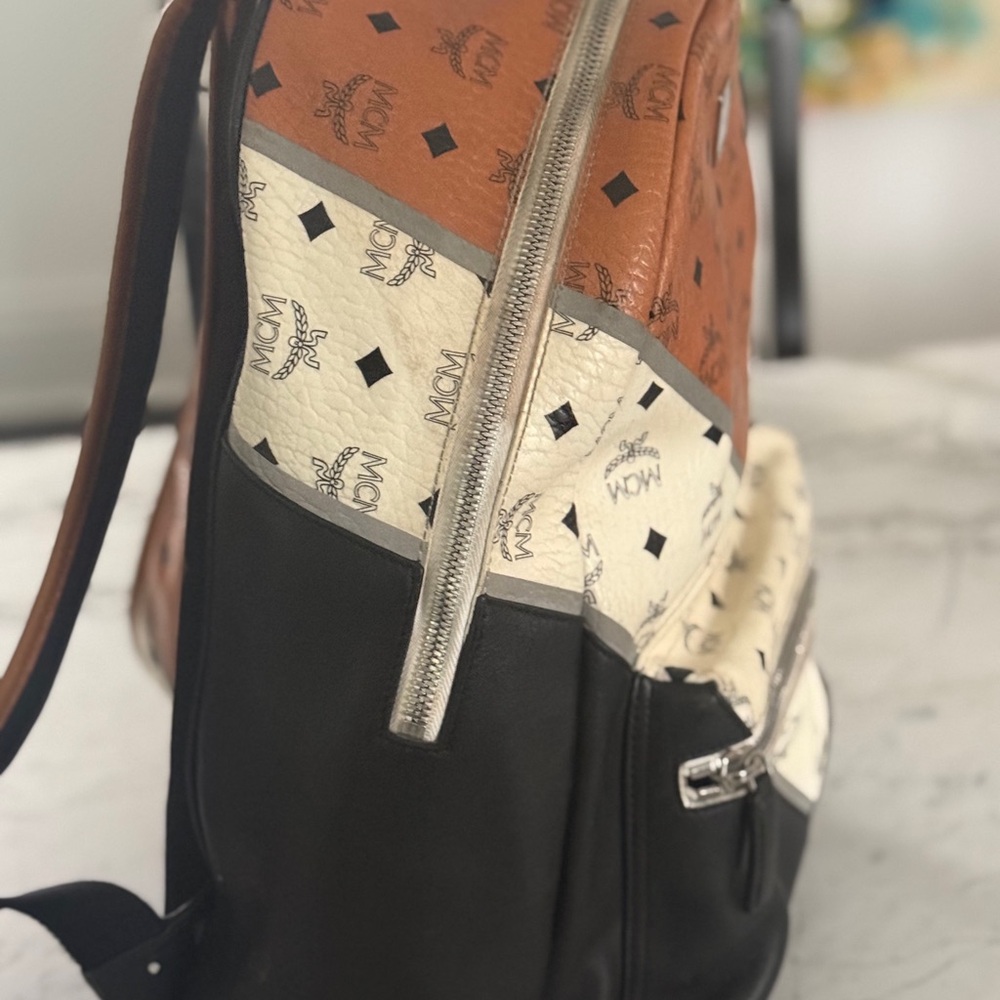 authentic MCM black, tan and cream leather backpack